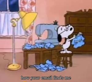 Still from a Peanuts cartoon of Snoopy at a sewing machine.