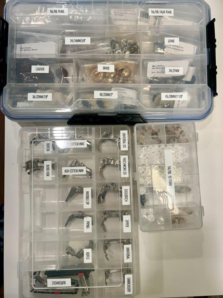 Three clear organizers of sewing supplies, all neatly labeled