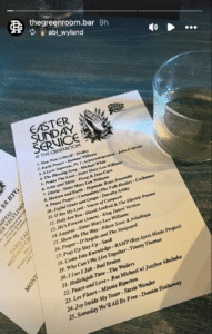 Screenshot of an Instagram story with a printed program of music on a bar with a glass of wine