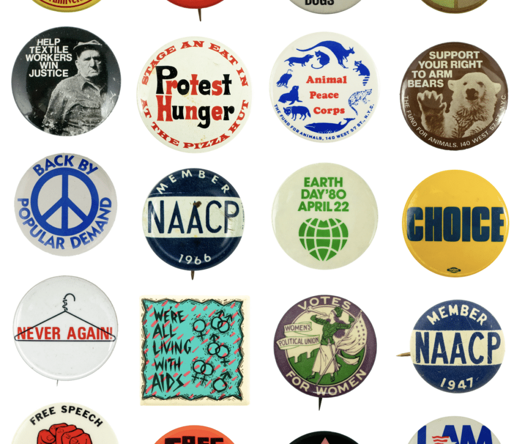 an evenly spaced grid of different colorful pinback buttons with protest slogans