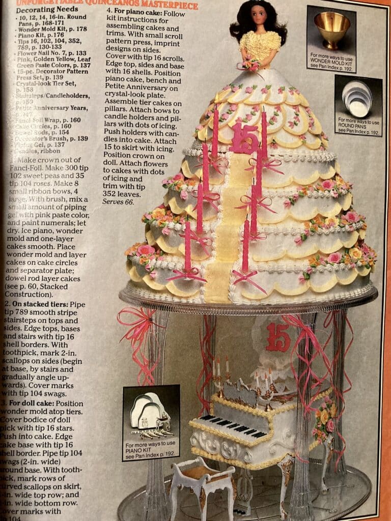 Page from a Wilton book showing an elaborate tiered cake in the shape of a dress, with a doll on the top and a piano underneath